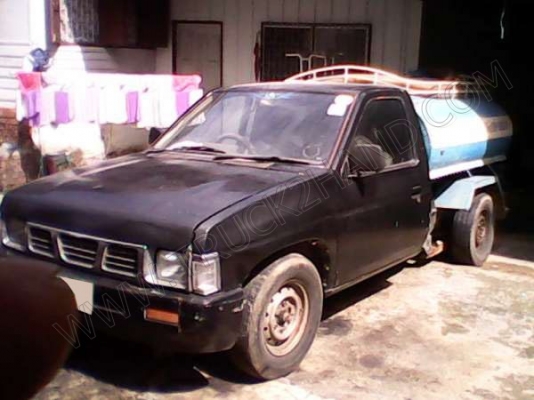รถกระบะ บรรทุกน้ำ ยี่ห้อ NISSAN รุ่น BIG M รถกระบะ บรรทุกน้ำ ยี่ห้อ NISSAN รุ่น BIG M