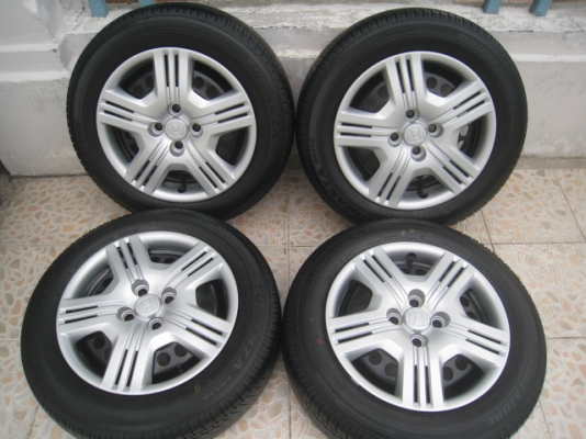 ขายกะทะล้อป้ายแดง Honda jazz + ฝาครอบ + ยางปี 1513  (081-3747940)