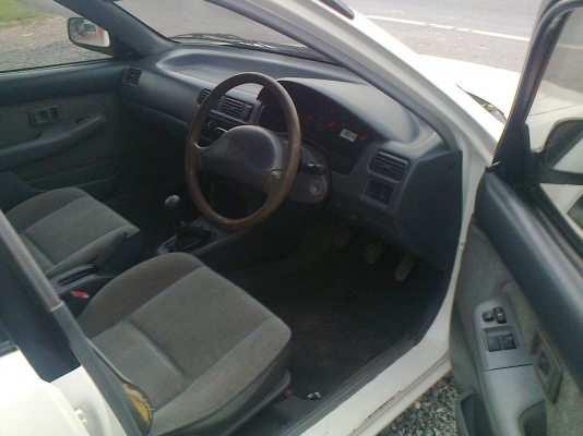 ขายถูกมากโซรูน่าปี97เกียร์ธรรมดากระจกไฟฟ้ารถเดิมๆสีเต็มระบบทุกอย่างใช้ได้ครบ(มุมไฟเลี้ยวข้างซ้ายเคยโดนมอไซร์ชนที่เดียว)