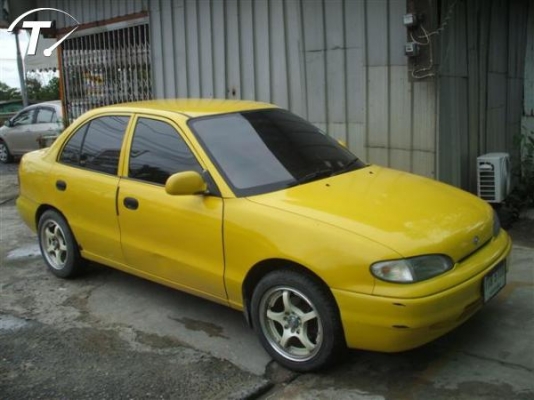 ขาย ฮุนได accent (4Dr) ปี96 สีเหลือง เกียร์ธรรมดา 1.5 GLI ติดแก๊ส LPG สภาพดี สวย ด่วนๆ 43000