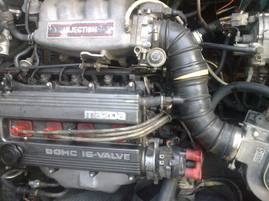 ขายรถโบรานเก๋งมาสด้า323 สีขาว5ประตู 45000