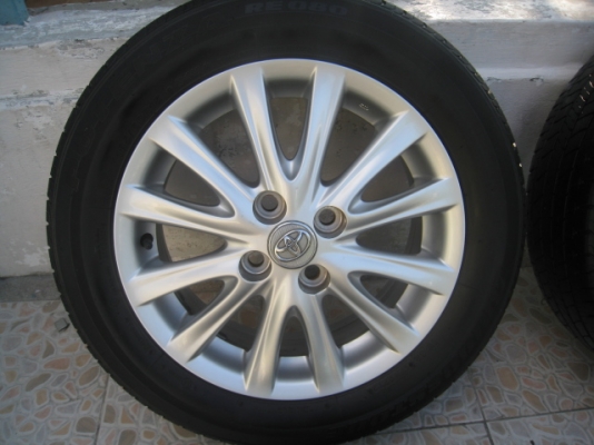 ขายล้อแม็ก Toyota vios 12 ก้าน 15"x5.5" et45 4รู100 +ยางต้นปี12 ครับ  สนใจติดต่อเล็กคลองสามครับ (081-3747940)