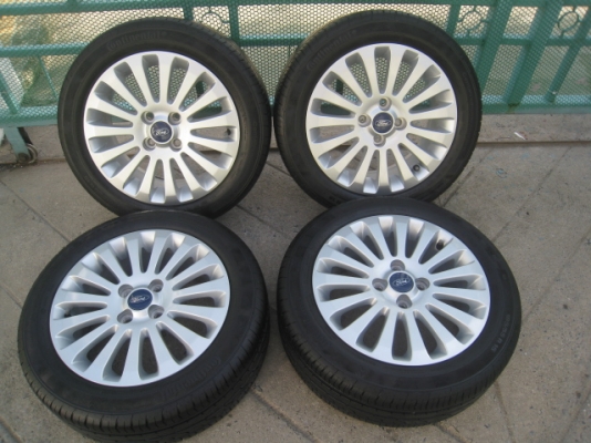 ขายล้อแม็ก Ford fiesta 15"x6" et45 4รู100 + ยาง ปี 12  Toyota ,Suzuki, Mazda ก็ใส่ได้ครับ (081-3747940)