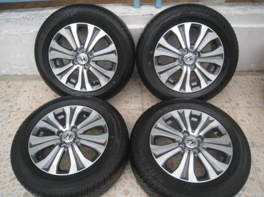 ขายล้อแม็ก Honda freed ถอดจากรถป้ายแดง 15"x5.5" et50 4รู 100 + ยางปี 12 ,3เส้นและปี13,1 เส้นครับ (081-3747940)