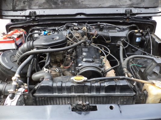 (รถลุยน้ำท่วม) SUZUKI  CARIBAN 1.3 ยกสูงเทินเพลา +พึ่งติดแก็ส LPG