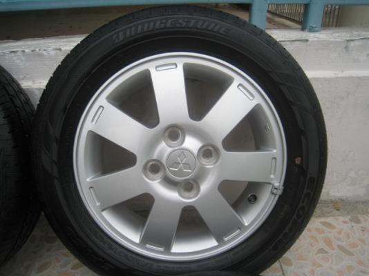 ขายแม็ก Mitsubishi mirage ถอดรถป้ายแดง 14"x4.5" et46 4รู100 +ยางปี0313  ตุ่มและสีหน้ายางมี(081-3747940)