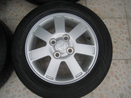 ขายแม็ก Mitsubishi mirage ถอดรถป้ายแดง 14"x4.5" et46 4รู100 +ยางปี0313  ตุ่มและสีหน้ายางมี(081-3747940)