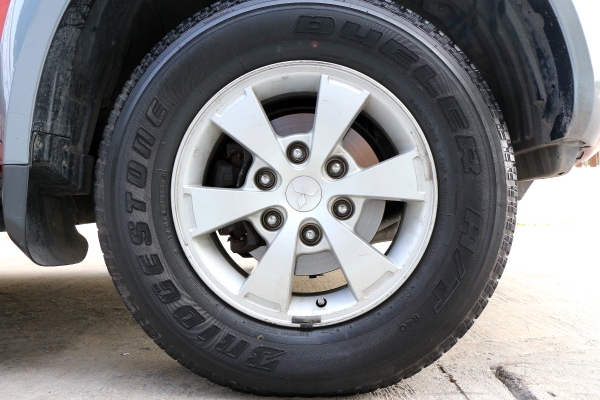 ต้องการขายแม็กไทตัน16x7+ยางBridgstone Dueler