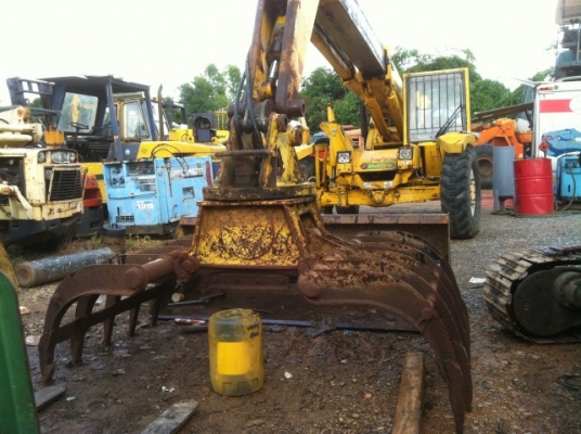 รถตัก/คีบอ้อยแบบหมุนได้รอบ ford 735 บูมยืด 8ม. ยกได้3.5 ตัน