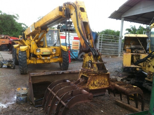 รถตัก/คีบอ้อยแบบหมุนได้รอบ ford 735 บูมยืด 8ม. ยกได้3.5 ตัน