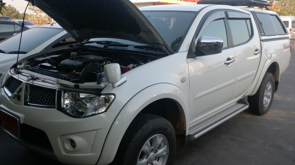 ขาย ..ไททันพลัส 4 ประตู สภาพป้ายแดง สีขาวมุขสวย หรือแลกกับรถบรรทุก เงื่อนไขและราคาคุยกันครับ