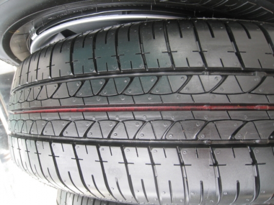 ขายกะทะล้อ Nissan almera ขอบ14 4รู100 +ฝาครอบ+ยางปี13 ตอนนี้มี 2 ชุดครับ(081-3747940)