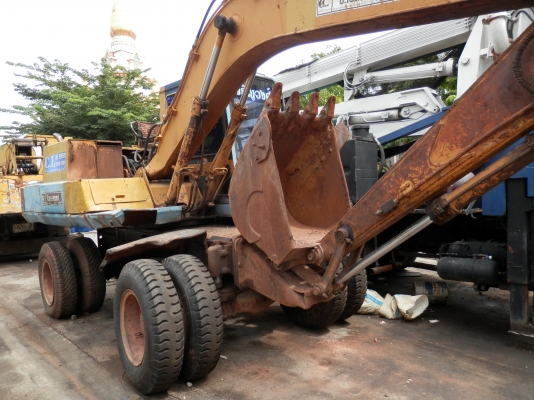 แบคโฮล้อยาง KOMATSU PW100-3-2เพลา มีแอร์ ลายหัวเจาะ อินวอยซ์