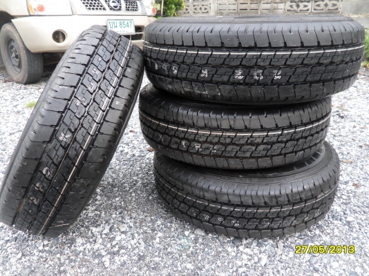 ขายยางป้ายแดงพร้อมกะทะเหล็ก 6 รู ยางDUNLOP 215/70R15  ตุ่มเส้นสียังอยู่ครบ 1ชุด