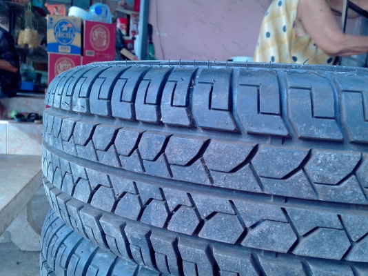 ขายยางพร้อมกะทะ ขอบ14ใช้งานไม่ถึง15โล ยางปี2012