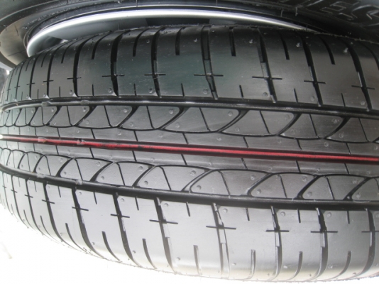 ขายกะทะล้อ Nissan almera ขอบ14 4รู100 +ฝาครอบ+ยางปี13 ตอนนี้มี 2 ชุดครับ(081-3747940)