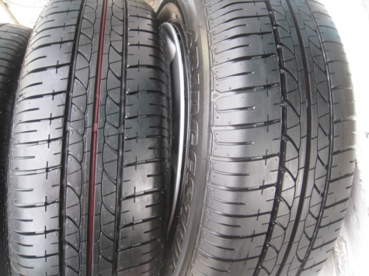 ขายกะทะล้อ Nissan almera ขอบ14 4รู100 +ฝาครอบ+ยางปี13 ตอนนี้มี 2 ชุดครับ(081-3747940)