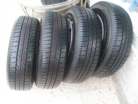 ขายกะทะล้อ Nissan almera ขอบ14 4รู100 +ฝาครอบ+ยางปี13 ตอนนี้มี 2 ชุดครับ(081-3747940)