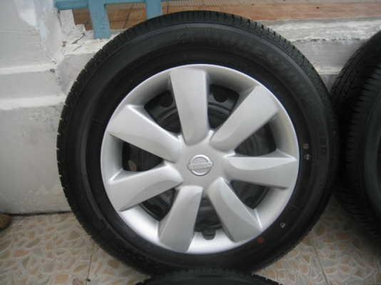 ขายกะทะล้อ Nissan almera ขอบ14 4รู100 +ฝาครอบ+ยางปี13 ตอนนี้มี 2 ชุดครับ(081-3747940)