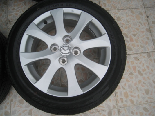 ขายล้อแม็ก Mazda2 ป้ายแดง 15"x6" et45 4รู100 + ยางปี 1313 สนใจติดต่อเล็กคลองสามครับ (081-3747940)