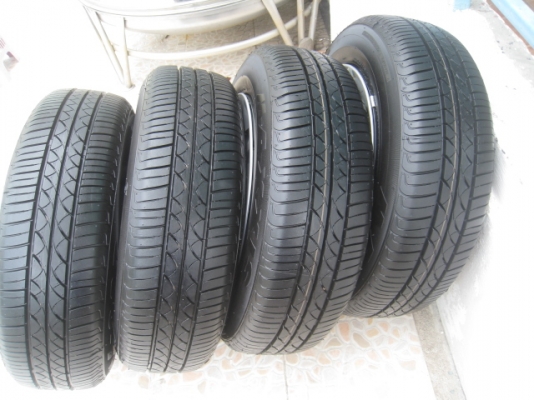 ขายกะทะล้อ Nissan march ขอบ14 4รู100 +ฝาครอบ+ยางปี1313 (081-3747940)