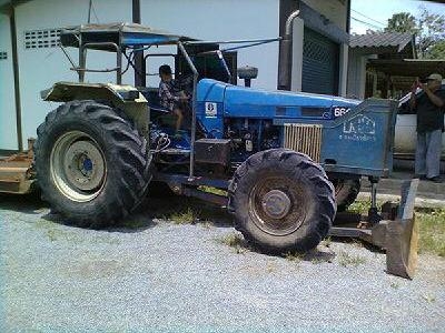 ขายรถไถ FORD 6640 2เพลา เอกสารเล่มทะเบียน 7 จาน 3 จาน ใบมีดดันหน้า เครื่องเขียว กระโปรงขาว ราคา 650000
