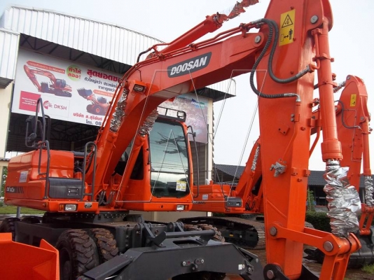 ขาย รถแม็คโคล้อยาง DOOSAN DX140W ( รถใหม่ ไฟแนนท์ผ่านรับรถได้เลย! ) ขาย รถแม็คโคล้อยาง DOOSAN DX140W ( รถใหม่ ไฟแนนท์ผ่านรับรถได้เลย! )