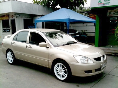 2005 Mitsubishi New Lancer 1.6 GLXI-MT แม็กซ์ 17 นิ้ว เบาะหนังเซนเซอร์ถอยหลังบอกตำแหน่งวิทยุซีดี กระจกไฟฟ้าเซนทรัลล็อคทะเบียนพร้อมโอน หรือ จัดไฟแนนท์ได้