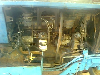 ขายรถไถ FORD 6640 เพลาเดี่ยว เอกสารเล่มทะเบียน 7 จาน ใบมีดดันหน้า ราคา 420000