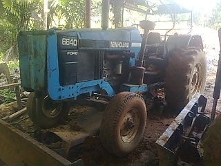 ขายรถไถ FORD 6640 เพลาเดี่ยว เอกสารเล่มทะเบียน 7 จาน ใบมีดดันหน้า ราคา 420000 ขายรถไถ FORD 6640 เพลาเดี่ยว เอกสารเล่มทะเบียน 7 จาน ใบมีดดันหน้า ราคา 420000