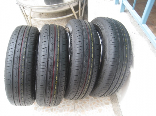 ขายกะทะล้อ Mitsubishi attrage ป้ายแดง ขอบ14 4รู100 +ฝาครอบ +ยางปี13 สนใจติดต่อ เล็กคลองสามครับ (081-3747940)