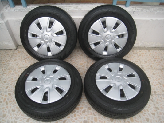 ขายกะทะล้อ Mitsubishi attrage ป้ายแดง ขอบ14 4รู100 +ฝาครอบ +ยางปี13 สนใจติดต่อ เล็กคลองสามครับ (081-3747940)