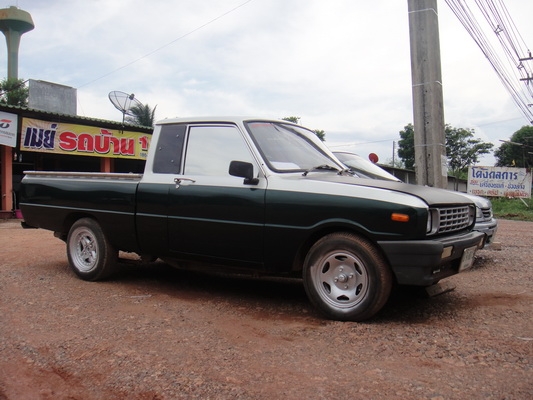 ขายมาสด้า 1300 สีเขียว  ปี 91  แอร์เย็น  ติดแก๊สแล้ว  ทะเบียนพร้อมชุดโอน