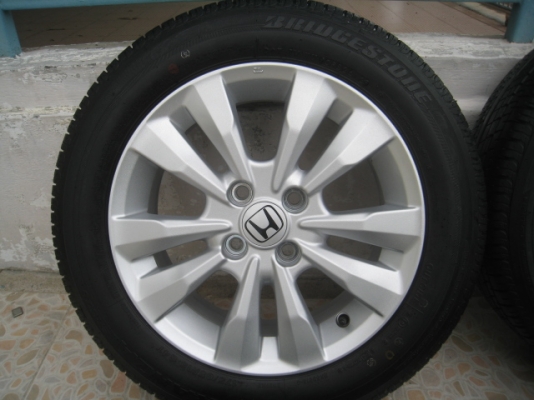 ขายล้อแม็ก Honda city ป้ายแดง 15'x5.5" et45 4รู100 + ยางปี13  สนใจติดต่อ เล็กคลองสามครับ (081-3747940)