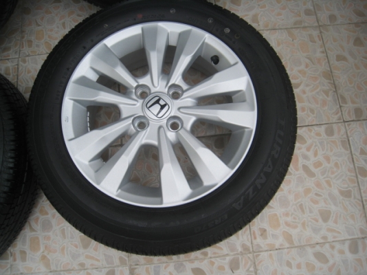 ขายล้อแม็ก Honda city ป้ายแดง 15'x5.5" et45 4รู100 + ยางปี13  สนใจติดต่อ เล็กคลองสามครับ (081-3747940)