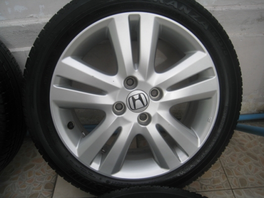 ขายล้อแม็ก Honda Jazz 16"x6" et53 4รู100 +ยาง ปี 10  สนใจติดต่อ เล็กคลองสามครับ (081-3747940)