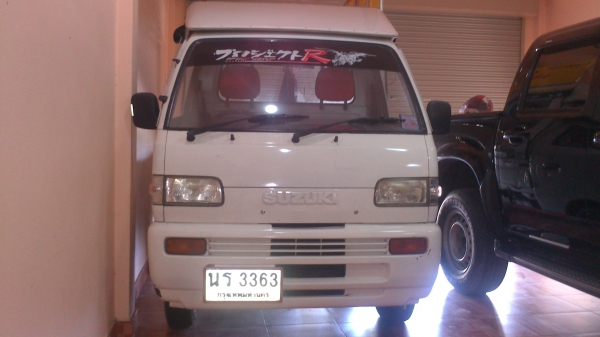 ขายกระป้อ SUZUKI ประตูโค้งสีขาว