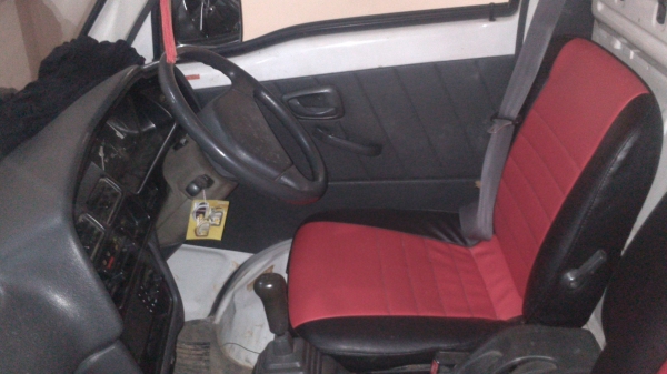 ขายกระป้อ SUZUKI ประตูโค้งสีขาว