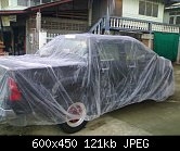 จำหน่าย ผ้าคลุมรถ แบบใส กันน้ำ กันฝุ่น ทำจากพลาสติกแบบหนาเป็นผ้ามัน