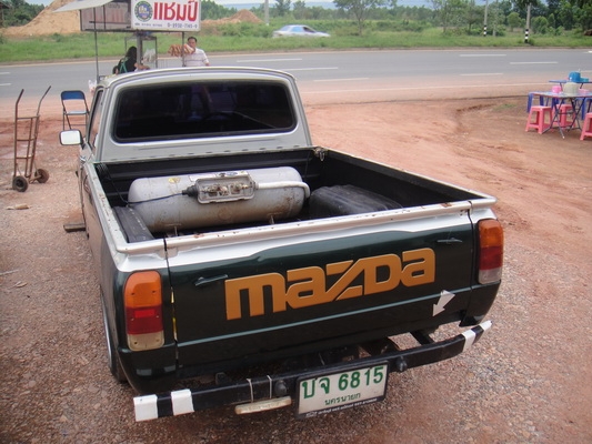 ขายมาสด้า 1300 สีเขียว  ปี 91  แอร์เย็น  ติดแก๊สแล้ว  ทะเบียนพร้อมชุดโอน