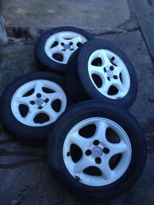 ขายล้อเดิม honda ขอบ14  4/100 พร้อมยาง สภาพควรเปลี่ยน ถูกๆ 3000.-