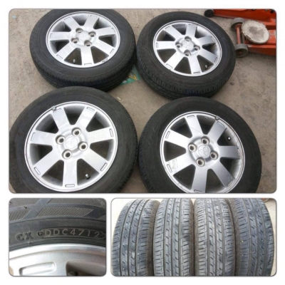 ขายล้อแม็กเดิม Mitsubishi Mirage ขอบ 14 พร้อมยาง ปี 12 ราคา 4,900 บาทถูก