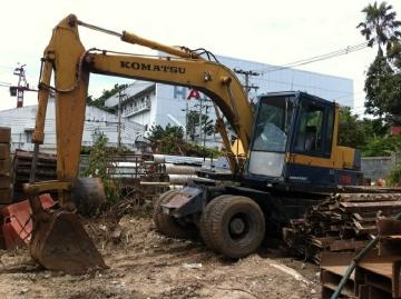 รถแบคโฮล้อยาง PW100-5 เครื่องปั้มเดิม2เพลา พร้อมหัวเจาะ