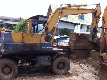 รถแบคโฮล้อยาง PW100-5 เครื่องปั้มเดิม2เพลา พร้อมหัวเจาะ