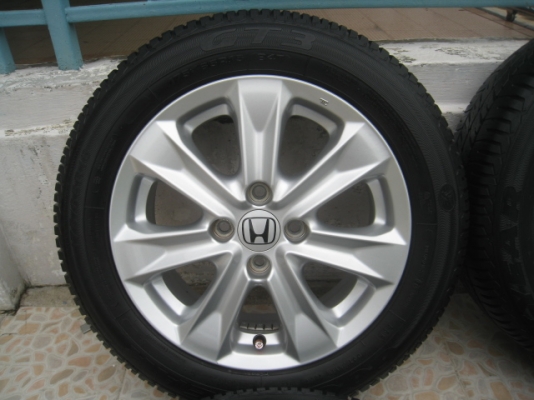 ขายล้อแม็ก Honda jazz 15"x5.5" et45 4รู100 +ยาง ปี3612 สนใจติดต่อเล็กคลองสามครับ (081-3747940)