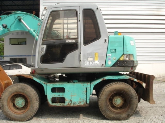 ขายด่วนรถแบ็คโฮสภาพพร้อมใช้งาน KOBELCO รุ่น SK100W-2 ล้อยางราคาพิเศษ คลิกเลยค่ะ ขายด่วนรถแบ็คโฮสภาพพร้อมใช้งาน KOBELCO รุ่น SK100W-2 ล้อยางราคาพิเศษ คลิกเลยค่ะ