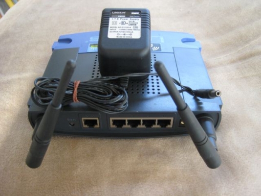 ขาย Linksys WRT54G v5 Wireless-G broadband router+หม้อแปลง มือสองพร้อมใช้งาน ราคา 850 บาท รวมค่าส่งฟรีๆ ขาย Linksys WRT54G v5 Wireless-G broadband router+หม้อแปลง มือสองพร้อมใช้งาน ราคา 850 บาท รวมค่าส่งฟรีๆ