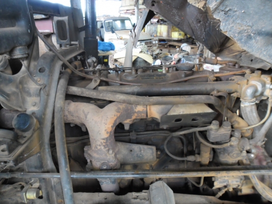 ขายรถเทเลอร์บรรทุกรถแบคโฮคัสซีมิตรซู FN 215 K หัวฮีโน่ เครื่อง HINO EK 100 ซ่วงล่างมิตรซู 2 เพลาหางเหล็ก H บีมทะเบียนเต็ม