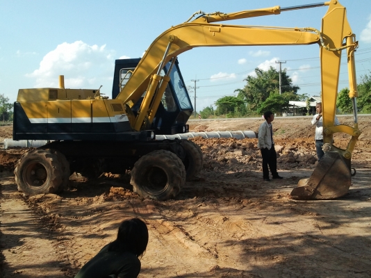 ขายแบ็คโฮล้อยาง KOMATSU PW 100
