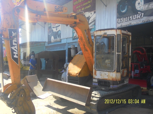 ขายรถแบ็คโฮhanix sb30sพร้อมที่คีบไม้เก่านอก